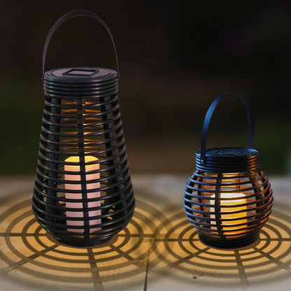 Zylindrische Solarlaterne aus Rattanoptik in Dunkelbraun/Schwarz mit warmweißem Licht